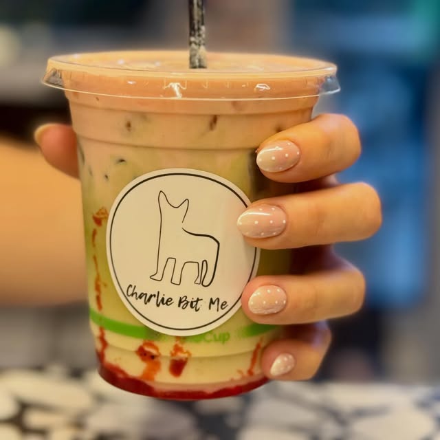Iced Charlie Bit Me drink with the cafe logo